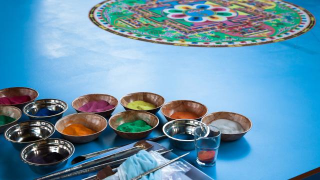 Make sand mandalas with a monk