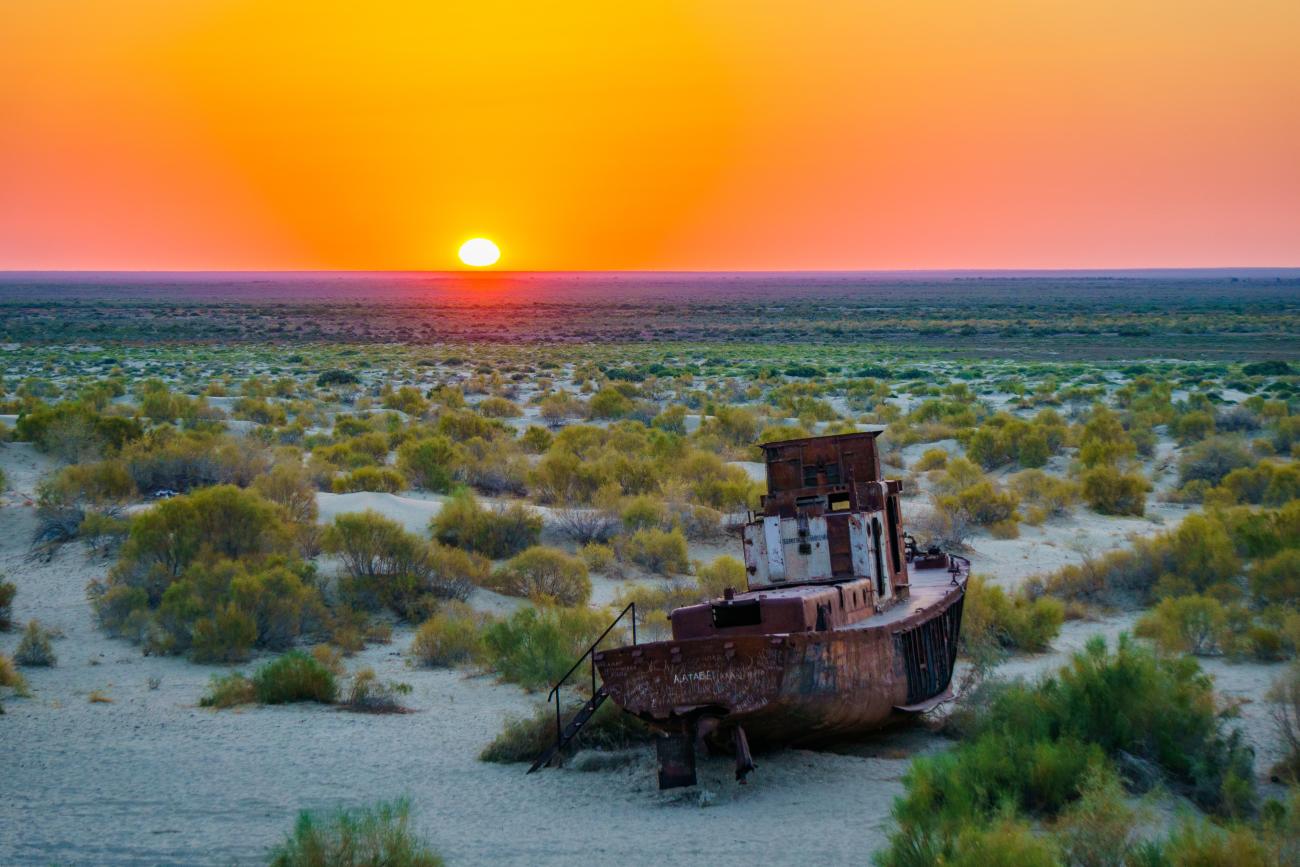 Sunset view of Aral Sea's ship graveyard in Karakalpakstan, Uzbekistan