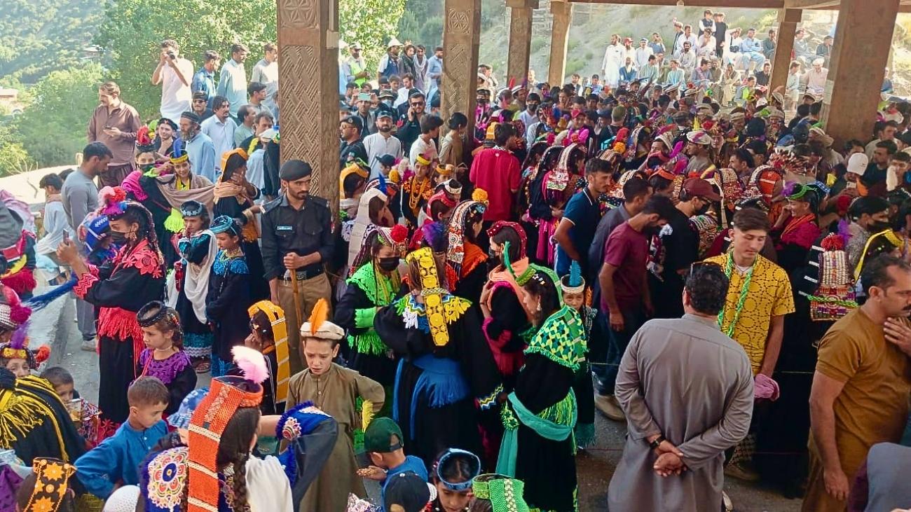 Big group of indigenous Kalash people in Pakistan during a festival